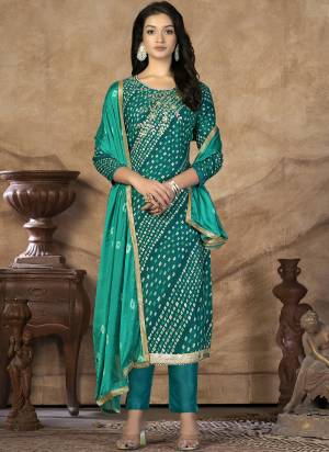 Grab These Suit in Fine Colored Pair With Bottom And Dupatta.These Top Are Jam Cotton And Dupatta Are Fabricated On Naznin Pair With Cotton Bottom.Its Beautified With Designer Perinted With Hand Work.