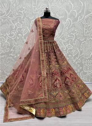 For A Fancy Designer Look,Grab These Lehenga Choli With Dupatta in Fine Colored.These Lehenga And Choli Are Bridal Net And Dupatta Are Fabricated On Soft Net Pair.Its Beautified With Designer Fancy Multy Thread,Sequance,Dori Embroidery,Diamond Work.