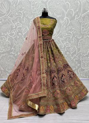 For A Fancy Designer Look,Grab These Lehenga Choli With Dupatta in Fine Colored.These Lehenga And Choli Are Bridal Net And Dupatta Are Fabricated On Soft Net Pair.Its Beautified With Designer Fancy Multy Thread,Sequance,Dori Embroidery,Diamond Work.