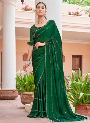 Garb These Designer Saree in Fine Colored.These Saree Are Satin Chiffon And Blouse is Fabricated On Satin Chiffon Pair.Its Beautified With Heavy Swarovski Work.