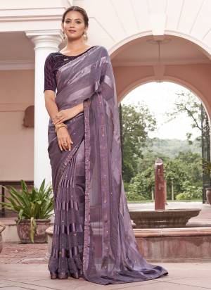 Garb These Designer Saree in Fine Colored.These Saree Are Chiffon And Blouse is Fabricated On Art Silk Pair.Its Beautified Peding Color,Wevon Satin Patta,Sequance Work.