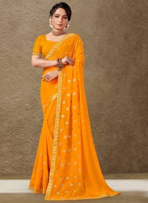 Garb These Saree in Fine Colored.These Saree Are Georgette And Blouse is Fabricated On Art Silk Pair.Its Beautified With Blooming Color With Jari Embroidery Work.