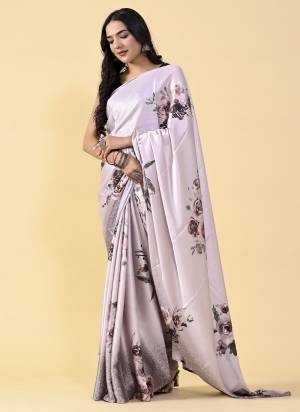 Garb This Partywear Saree Paired With Contrast Blouse.This Saree Are Satin Silk And Blouse Are Silk Based Fabric With Designer Digital Printed. Buy This Pretty Saree Now.