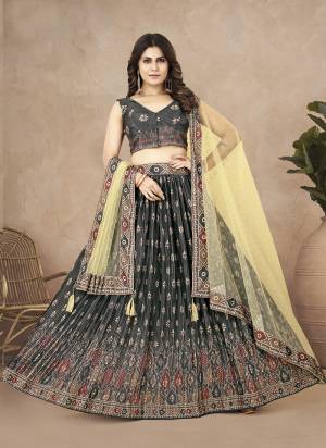 For A Designer Look,Grab These Lehenga Choli in Fine Colored.These Lehenga And Blouse Are Fabricated On Chinon Silk Pair With Net Dupatta.Its Beautified With Digital Printed With Crushed Work.