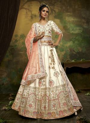 Attrective Looking This Partywear Fine Color Heavy Designer Choli Fabric Silk And Lahenga Silk And Dupatta Net In Fabricated Beautified With Attrective Thread,Sequance Embroidery,Stone And Beads Work. Buy Now.