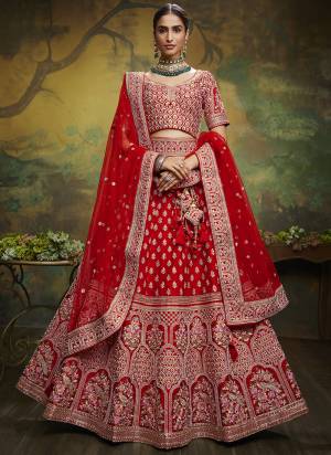 Attrective Looking This Partywear Fine Color Heavy Designer Choli Fabric Silk And Lahenga Silk And Dupatta Net In Fabricated Beautified With Attrective Thread,Sequance Embroidery,Stone And Beads Work. Buy Now.