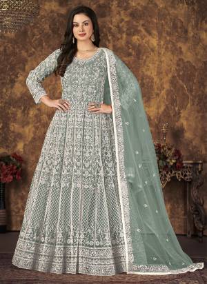 Grab These Beautiful Looking Designer Gown With Dupatta.Its Beautified With Designer Embroidery Work.