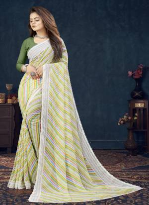 Attrective These Printed Designer Saree in Fine Colored.These Saree Are Renial And Blouse is Fabricated On Renial Pair.