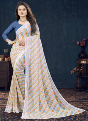 Attrective These Printed Designer Saree in Fine Colored.These Saree Are Renial And Blouse is Fabricated On Renial Pair.