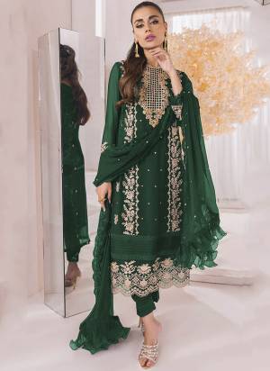 Green colored pakistani suit is prettified with floral embroidered as shown which makes it appear classy. This top is made of georgette fabric which is accompanied with santoon bottom, santoon lining and georgette work dupatta. Women can buy this suit to wear for their festive, parties, functions and event.