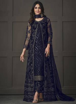 Step out in style adorning this blue colored pakistani straight suit. This butterfly net suit is beautifully adorned with heavy embroidered,floral lace,cording & glitter sequences work comes along with net & japan silk bottom, inner is japan satin and net dupatta makes it appear more adorning. Women can buy this suit to wear for their upcoming festivals, homely functions, parties, kitties, weekend get together. Get this unstitched suit stitched according to your fit and comfort.