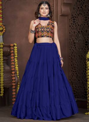 Grab These Navratri Special Lehenga Choli in Fine Colored.These Lehenga Are French Crepe And Choli Are Banglori Silk And Dupatta Are Fabricated On Chiffon Pair.Its Beautified With Designer Thread,Mirror Embroidery Work.