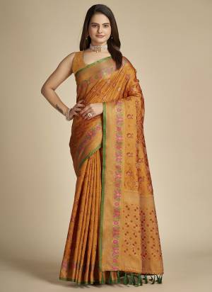 Garb This Partywear Saree Paired With Blouse In Fine Color.This Saree And Blouse Are Patola Silk Based Fabric With Weaving Jacquard Designer. Buy This Pretty Saree Now.