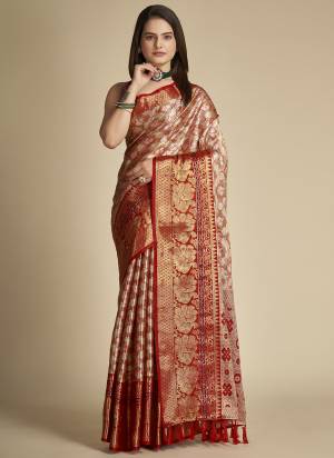 Garb This Partywear Saree Paired With Blouse In Fine Color.This Saree And Blouse Are Tissue Silk Based Fabric With Weaving Jacquard Designer. Buy This Pretty Saree Now.