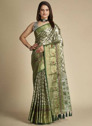 Garb This Partywear Saree Paired With Blouse In Fine Color.This Saree And Blouse Are Tissue Silk Based Fabric With Weaving Jacquard Designer. Buy This Pretty Saree Now.