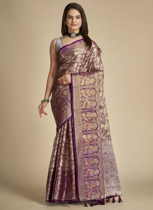 Garb This Partywear Saree Paired With Blouse In Fine Color.This Saree And Blouse Are Tissue Silk Based Fabric With Weaving Jacquard Designer. Buy This Pretty Saree Now.