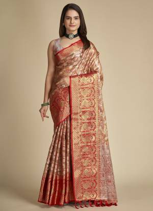 Garb This Partywear Saree Paired With Blouse In Fine Color.This Saree And Blouse Are Tissue Silk Based Fabric With Weaving Jacquard Designer. Buy This Pretty Saree Now.