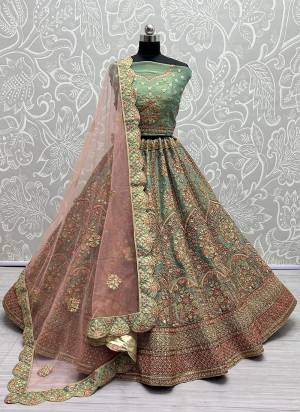 For A Fancy Designer Look,Grab These Lehenga Choli With Dupatta in Fine Colored.These Lehenga And Choli Are Bridal Net And Dupatta Are Fabricated On Soft Net Pair.Its Beautified With Designer Fancy Multy Thread,Sequance,Dori Embroidery,Diamond Work.