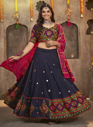 Grab These Navratri Special Lehenga Choli in Fine Colored.These Lehenga And Blouse Are Viscose Rayon And Dupatta Are Fabricated On Cotton.Its Beautified With Printed,Heavy Mirror,Thread Embroidery Work.