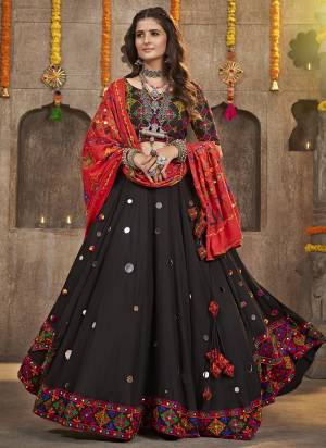 Grab These Navratri Special Lehenga Choli in Fine Colored.These Lehenga And Blouse Are Viscose Rayon And Dupatta Are Fabricated On Cotton.Its Beautified With Printed,Heavy Mirror,Thread Embroidery Work.