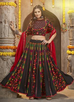 Grab These Navratri Special Lehenga Choli in Fine Colored.These Lehenga And Blouse Are Viscose Rayon And Dupatta Are Fabricated On Cotton.Its Beautified With Crushed,Heavy Mirror,Thread Embroidery Work.