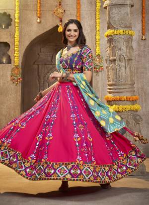 Grab These Navratri Special Lehenga Choli in Fine Colored.These Lehenga And Blouse Are Viscose Rayon And Dupatta Are Fabricated On Cotton.Its Beautified With Printed,Heavy Mirror,Thread Embroidery Work.