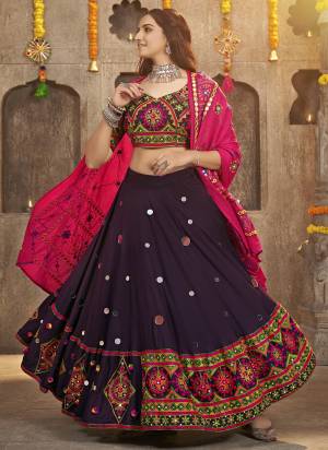 Grab These Navratri Special Lehenga Choli in Fine Colored.These Lehenga And Blouse Are Viscose Rayon And Dupatta Are Fabricated On Cotton.Its Beautified With Printed,Heavy Mirror,Thread Embroidery Work.