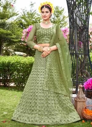 Grab These Beautiful Colored Lehenga Choli.These Lehenga and Dupatta Are Fabricated On Net Pair With Net Blouse.Its Beautified With Heavy Thread,Sequance Embroidery Work.