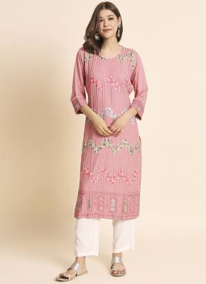 Garb These Beautiful Looking Readymade Kurti.These Kurti is Fabricated On Rayon.Its Beautified With Designer Lucknowi Chikankari Embroidery Work.