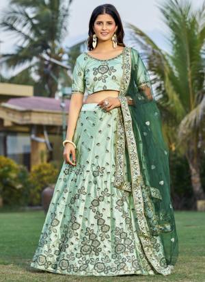 Grab These Beautiful Colored Lehenga Choli.These Lehenga and Dupatta Are Fabricated On Net Pair With Net Blouse.Its Beautified With Heavy Thread, Embroidery Work.