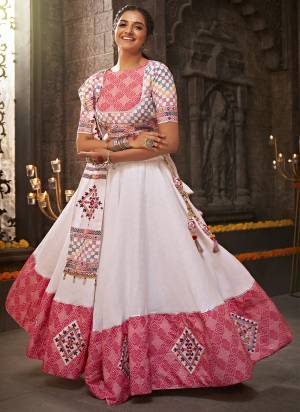 Attrective These Navratri Special Lehenga Choli in Fine Colored.These Lehenga Are Jacquard Cotton And Blouse Are Cotton And Dupatta Are Fabricated On Cotton.Its Beautified With Heavy Mirror,Thread Embroidery Work.