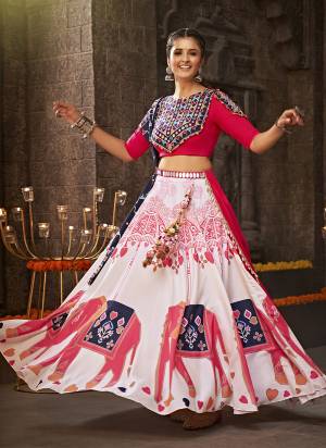 Attrective These Navratri Special Lehenga Choli in Fine Colored.These Lehenga Are Rayon And Blouse Are Viscoce Rayon And Dupatta Are Fabricated On Viscose Rayon.Its Beautified With Heavy Mirror,Thread Embroidery Work.