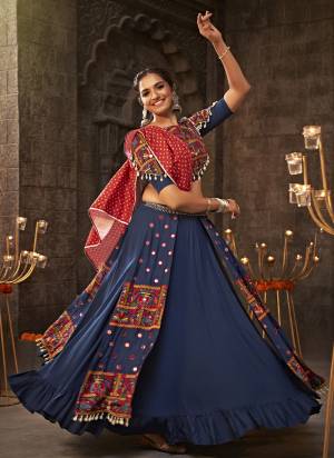 Attrective These Navratri Special Lehenga Choli in Fine Colored.These Lehenga Are Viscose Rayon And Blouse Are Viscoce Rayon And Dupatta Are Fabricated On Rayon.Its Beautified With Heavy Mirror,Thread Embroidery Work.