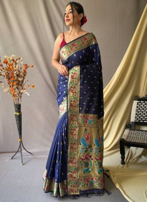 Garb These Party Wear Saree With Blouse in Fine Colored.These Saree And Blouse is Fabricated On Soft Silk.Its Beautified With Paithani Meenakari Jari Wevon Designer.