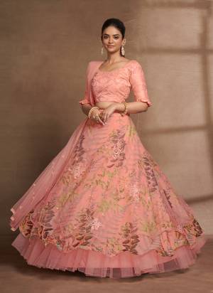 For A Designer Look,Grab These Lehenga Choli in Fine Colored.These Lehenga Are Net And Organza And Dupatta Are Fabricated On Net Pair With Italian Silk Blouse.Its Beautified With Digital Printed With Thread,Sequance Embroidery Work.