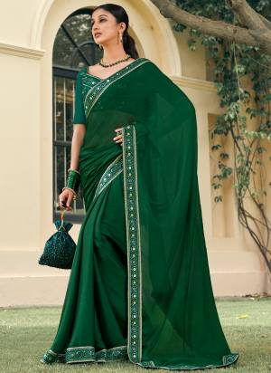 Garb These Designer Saree in Fine Colored.These Saree Are Satin Chiffon And Blouse is Fabricated On Art Silk Pair.Its Beautified Blooming Color,Mirror Embroidery Hand Work Border And Blouse.