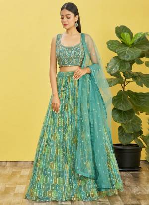 For A Designer Look,Grab These Lehenga Choli in Fine Colored.These Lehenga Are Organza And Blouse Are Fabricated On Slub Silk Pair With Organza Soft Net.Its Beautified With Designer Printed With Real Mirror,Thread,Jari,Sequance Embroidery Work.