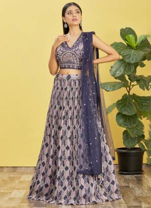 For A Designer Look,Grab These Lehenga Choli in Fine Colored.These Lehenga Are Chinon And Blouse Are Fabricated On Slub Silk Pair With Organza Soft Net.Its Beautified With Designer Printed With Real Mirror,Thread,Jari,Sequance Embroidery Work.