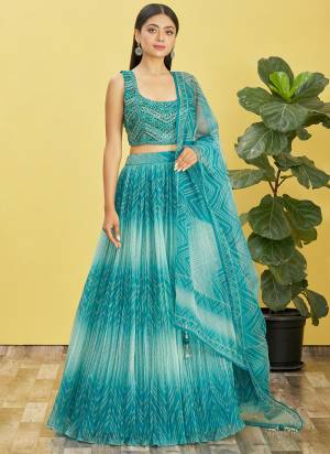 For A Designer Look,Grab These Lehenga Choli in Fine Colored.These Lehenga Are Organza And Blouse Are Fabricated On Slub Silk Pair With Organza Soft Net.Its Beautified With Designer Printed With Real Mirror,Thread,Jari,Sequance Embroidery Work.