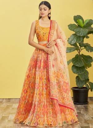 For A Designer Look,Grab These Lehenga Choli in Fine Colored.These Lehenga Are Organza And Blouse Are Fabricated On Slub Silk Pair With Organza Soft Net.Its Beautified With Designer Printed With Real Mirror,Thread,Jari,Sequance Embroidery Work.