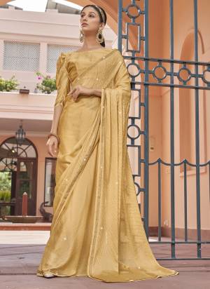 Garb These Designer Party Wear Saree in Fine Colored.These Saree Are Satin Chiffon And Blouse is Fabricated On Satin Chiffon Pair.Its Beautified Blooming Color With Swarovski Work Blouse,Border.