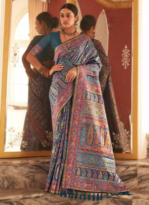 Looking These Party Wear Saree in Fine Colored.These Saree And Blouse is Fabricated On Pasmina Silk.Its Beautified With Weaving Heavy Designer.