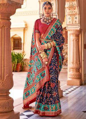 Looking These Party Wear Patola Saree in Fine Colored.These Saree And Blouse is Fabricated On Aircel Silk.Its Beautified With Patola With Gold Printed Designer.