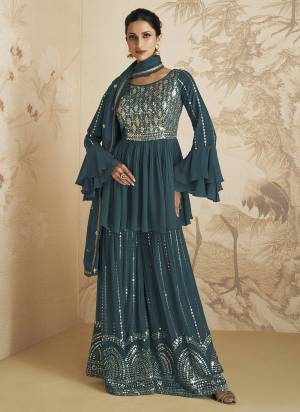 Garb These Designer Suits in Fine Colored Pair With Dupatta.These Top And Dupatta Are Fabricated On Chinon Pair With Chinon Bottom.Its Beautified With Heavy Designer Sequance Embroidery Work.