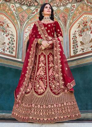 Grab These Bridal Look Lahenga Choli in Fine Colored.These Blouse And Lahenga Are Fabricated On Velvet Pair With Net Dupatta.Its Beautified With Heavy Designer Dori,Coding Embroidery,Zarkan Stone Work.