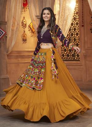 Attrective These Navratri Special Lehenga Choli With Koti in Fine Colored.These Lehenga And Blouse Are Viscose Rayon And Koti Are Fabricated On Viscose Rayon.Its Beautified With Heavy Mirror,Thread Embroidery Work.