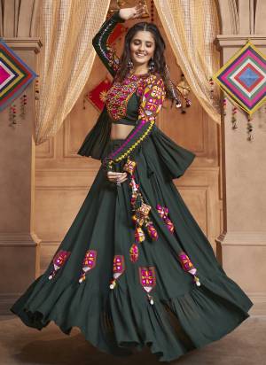 Attrective These Navratri Special Lehenga Choli With Koti in Fine Colored.These Lehenga And Blouse Are Viscose Rayon And Koti Are Fabricated On Viscose Rayon.Its Beautified With Heavy Mirror,Thread Embroidery Work.