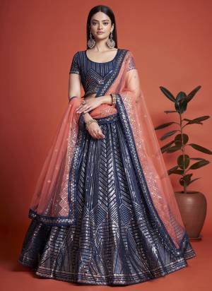 For A Designer Look,Grab These Lehenga Choli in Fine Colored.These Lehenga And Choli Are Fabricated On Georgette Pair With Soft Net Dupatta.Its Beautified With Heavy Designer Sequance,Thread Embroidery Work.