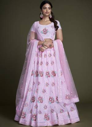 For A Designer Look,Grab These Lehenga Choli in Fine Colored.These Lehenga And Choli Are Fabricated On Georgette Pair With Soft Net Dupatta.Its Beautified With Heavy Designer Sequance,Thread Embroidery Work.