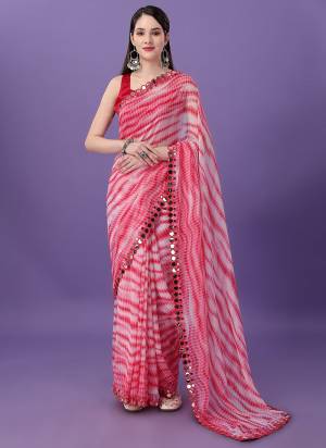 Garb These Party Wear Saree in Fine Colored.These Saree Are Georgette And Blouse is Art Silk Fabricated.Its Beautified With Designer Sabori Printed,Mirror Lace Border.